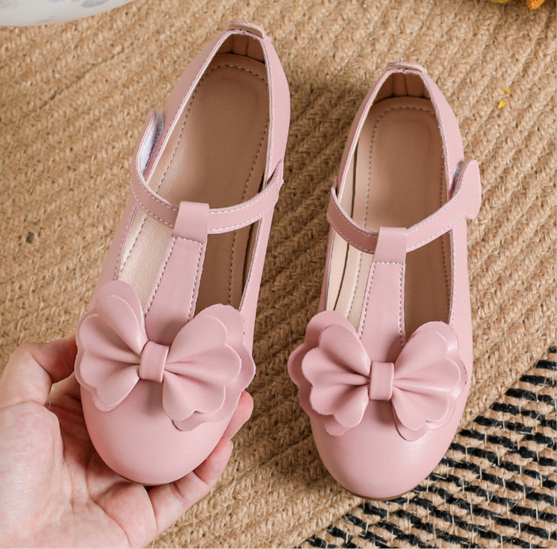 Pink bow t-strap bellies