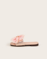 Big flower adorned pink slippers