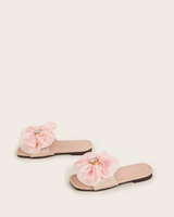 Big flower adorned pink slippers